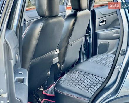 Серый Мицубиси Outlander Sport, объемом двигателя 2 л и пробегом 71 тыс. км за 13900 $, фото 28 на Automoto.ua