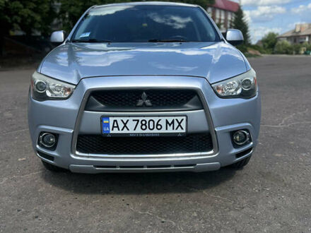 Серый Мицубиси Outlander Sport, объемом двигателя 2 л и пробегом 200 тыс. км за 11200 $, фото 1 на Automoto.ua