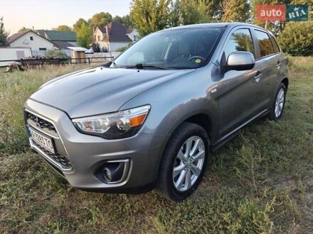 Серый Мицубиси Outlander Sport, объемом двигателя 2 л и пробегом 183 тыс. км за 11500 $, фото 1 на Automoto.ua