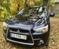 Синий Мицубиси Outlander Sport, объемом двигателя 2 л и пробегом 234 тыс. км за 9900 $, фото 1 на Automoto.ua