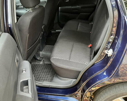 Синий Мицубиси Outlander Sport, объемом двигателя 2 л и пробегом 234 тыс. км за 9900 $, фото 16 на Automoto.ua