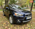 Синий Мицубиси Outlander Sport, объемом двигателя 2 л и пробегом 234 тыс. км за 9900 $, фото 2 на Automoto.ua