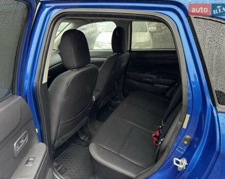 Синий Мицубиси Outlander Sport, объемом двигателя 2 л и пробегом 177 тыс. км за 12000 $, фото 10 на Automoto.ua