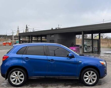 Синий Мицубиси Outlander Sport, объемом двигателя 2 л и пробегом 203 тыс. км за 8499 $, фото 3 на Automoto.ua