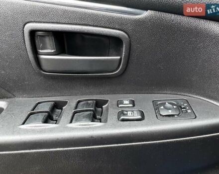 Синий Мицубиси Outlander Sport, объемом двигателя 2 л и пробегом 177 тыс. км за 12000 $, фото 18 на Automoto.ua