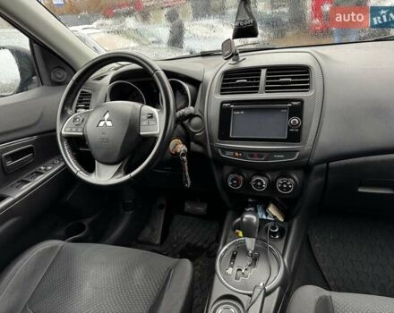 Синий Мицубиси Outlander Sport, объемом двигателя 2 л и пробегом 177 тыс. км за 12000 $, фото 13 на Automoto.ua