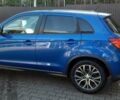 Синий Мицубиси Outlander Sport, объемом двигателя 2.4 л и пробегом 188 тыс. км за 11500 $, фото 5 на Automoto.ua