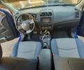 Синий Мицубиси Outlander Sport, объемом двигателя 2.4 л и пробегом 188 тыс. км за 11500 $, фото 13 на Automoto.ua