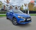 Синий Мицубиси Outlander Sport, объемом двигателя 2.36 л и пробегом 188 тыс. км за 11800 $, фото 9 на Automoto.ua