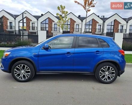 Синий Мицубиси Outlander Sport, объемом двигателя 2.36 л и пробегом 188 тыс. км за 11800 $, фото 2 на Automoto.ua