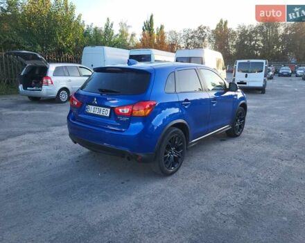Синий Мицубиси Outlander Sport, объемом двигателя 2 л и пробегом 136 тыс. км за 13800 $, фото 8 на Automoto.ua