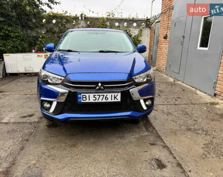Синий Мицубиси Outlander Sport, объемом двигателя 2.36 л и пробегом 155 тыс. км за 13700 $, фото 2 на Automoto.ua