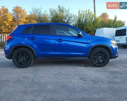 Синий Мицубиси Outlander Sport, объемом двигателя 2 л и пробегом 136 тыс. км за 13800 $, фото 3 на Automoto.ua