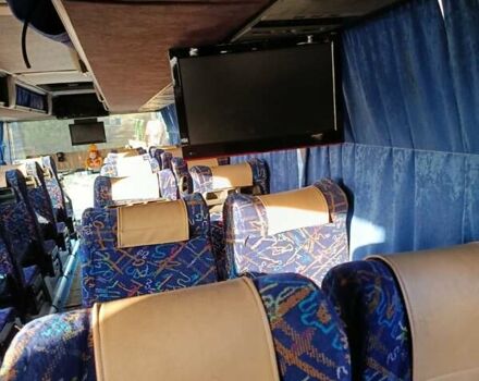 Оранжевый Неоплан 116, объемом двигателя 12 л и пробегом 400 тыс. км за 20000 $, фото 3 на Automoto.ua