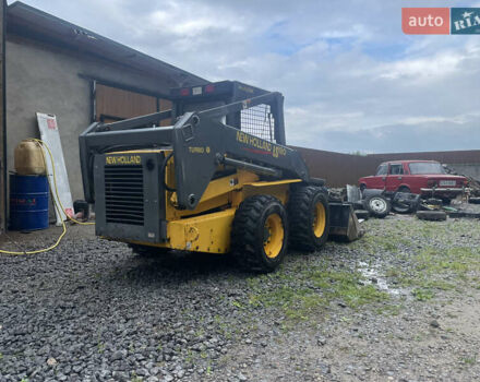Желтый Нью Холланд LB115 4PS, объемом двигателя 3.2 л и пробегом 1 тыс. км за 17000 $, фото 4 на Automoto.ua