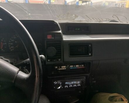 Зелений Ніссан 110, об'ємом двигуна 1.6 л та пробігом 400 тис. км за 600 $, фото 5 на Automoto.ua