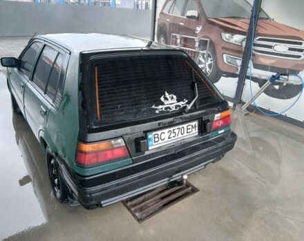 Зелений Ніссан 110, об'ємом двигуна 1.6 л та пробігом 400 тис. км за 600 $, фото 3 на Automoto.ua