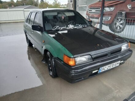 Зелений Ніссан 110, об'ємом двигуна 1.6 л та пробігом 400 тис. км за 600 $, фото 1 на Automoto.ua