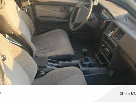Ниссан 210 1988 в Кременчуге на Automoto.ua Белый Ниссан 210, объемом двигателя 2 л и пробегом 300 тыс. км за 385 $, фото 1 на Automoto.ua