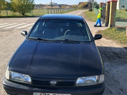 Черный Ниссан 210, объемом двигателя 1.6 л и пробегом 281 тыс. км за 1500 $, фото 1 на Automoto.ua