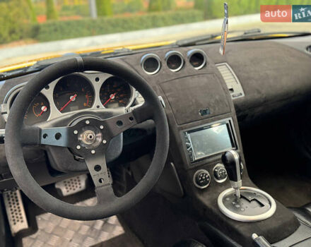 Желтый Ниссан 350З, объемом двигателя 3.5 л и пробегом 115 тыс. км за 12900 $, фото 23 на Automoto.ua