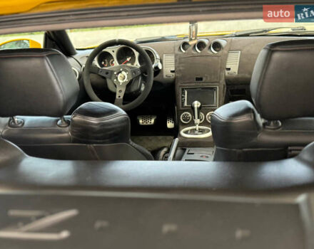 Желтый Ниссан 350З, объемом двигателя 3.5 л и пробегом 115 тыс. км за 12900 $, фото 20 на Automoto.ua