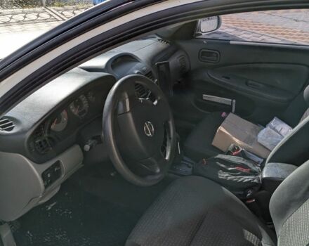 Белый Ниссан Альмера Классик, объемом двигателя 1.6 л и пробегом 220 тыс. км за 3800 $, фото 6 на Automoto.ua