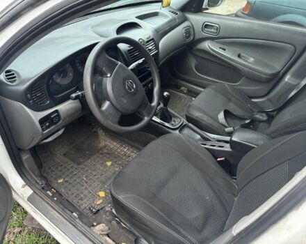 Білий Ніссан Альмера Класік, об'ємом двигуна 1.6 л та пробігом 325 тис. км за 1650 $, фото 9 на Automoto.ua