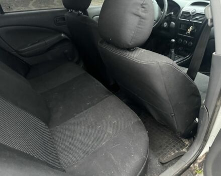 Білий Ніссан Альмера Класік, об'ємом двигуна 1.6 л та пробігом 325 тис. км за 1650 $, фото 12 на Automoto.ua