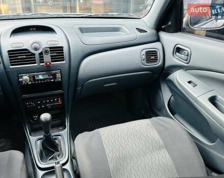 Бежевий Ніссан Альмера Класік, об'ємом двигуна 1.6 л та пробігом 61 тис. км за 6499 $, фото 21 на Automoto.ua