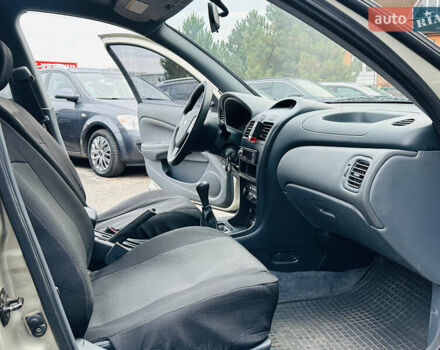 Бежевий Ніссан Альмера Класік, об'ємом двигуна 1.6 л та пробігом 61 тис. км за 6499 $, фото 27 на Automoto.ua