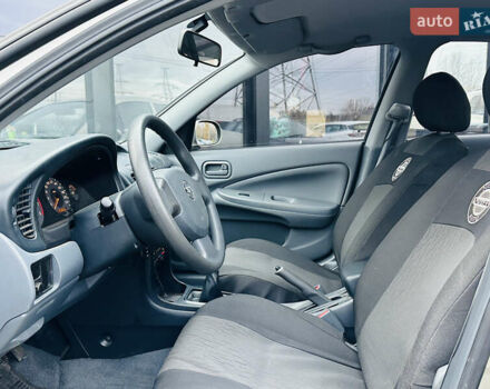 Бежевий Ніссан Альмера Класік, об'ємом двигуна 1.6 л та пробігом 61 тис. км за 6499 $, фото 14 на Automoto.ua