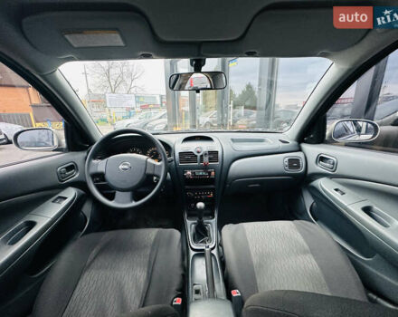 Бежевий Ніссан Альмера Класік, об'ємом двигуна 1.6 л та пробігом 61 тис. км за 6499 $, фото 22 на Automoto.ua