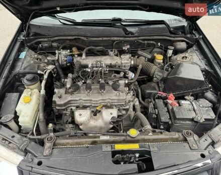 Чорний Ніссан Альмера Класік, об'ємом двигуна 1.6 л та пробігом 245 тис. км за 4600 $, фото 11 на Automoto.ua
