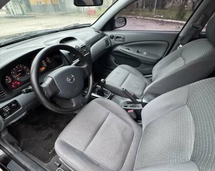 Чорний Ніссан Альмера Класік, об'ємом двигуна 1.6 л та пробігом 245 тис. км за 4600 $, фото 13 на Automoto.ua