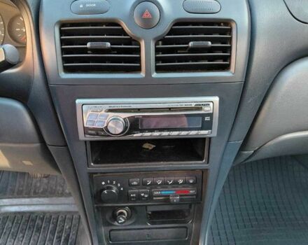 Чорний Ніссан Альмера Класік, об'ємом двигуна 1.6 л та пробігом 210 тис. км за 4600 $, фото 6 на Automoto.ua