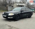 Чорний Ніссан Альмера Класік, об'ємом двигуна 1.6 л та пробігом 245 тис. км за 4600 $, фото 6 на Automoto.ua