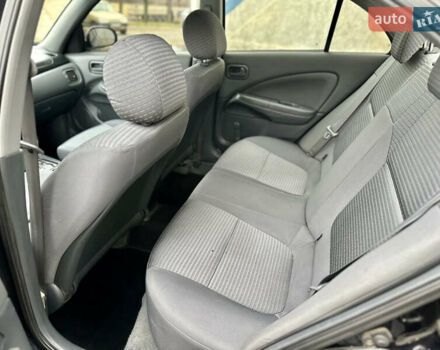 Черный Ниссан Альмера Классик, объемом двигателя 1.6 л и пробегом 183 тыс. км за 4400 $, фото 10 на Automoto.ua