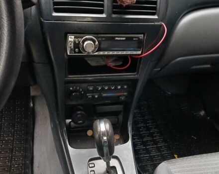 Черный Ниссан Альмера Классик, объемом двигателя 1.6 л и пробегом 182 тыс. км за 3600 $, фото 16 на Automoto.ua