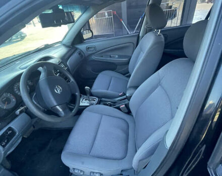 Черный Ниссан Альмера Классик, объемом двигателя 1.6 л и пробегом 253 тыс. км за 4600 $, фото 17 на Automoto.ua