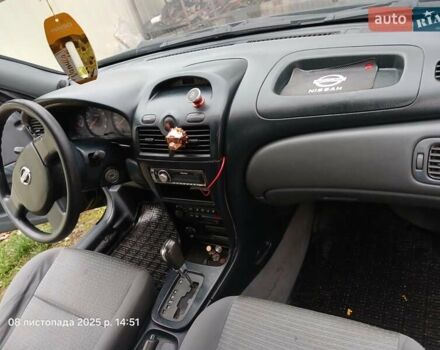 Черный Ниссан Альмера Классик, объемом двигателя 1.6 л и пробегом 182 тыс. км за 3600 $, фото 14 на Automoto.ua