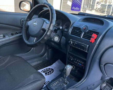 Черный Ниссан Альмера Классик, объемом двигателя 1.6 л и пробегом 250 тыс. км за 4800 $, фото 18 на Automoto.ua