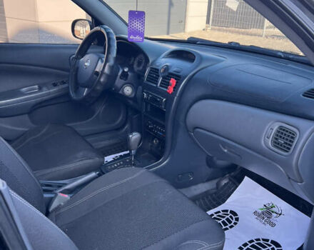 Черный Ниссан Альмера Классик, объемом двигателя 1.6 л и пробегом 250 тыс. км за 4800 $, фото 17 на Automoto.ua