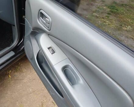 Черный Ниссан Альмера Классик, объемом двигателя 1.6 л и пробегом 182 тыс. км за 3600 $, фото 12 на Automoto.ua