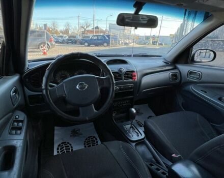 Черный Ниссан Альмера Классик, объемом двигателя 1.6 л и пробегом 250 тыс. км за 4800 $, фото 16 на Automoto.ua