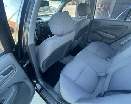 Черный Ниссан Альмера Классик, объемом двигателя 1.6 л и пробегом 253 тыс. км за 4600 $, фото 13 на Automoto.ua