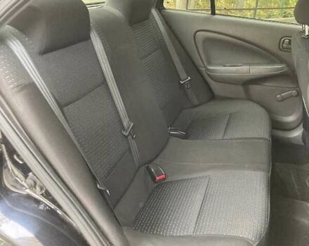 Черный Ниссан Альмера Классик, объемом двигателя 1.6 л и пробегом 155 тыс. км за 4200 $, фото 3 на Automoto.ua