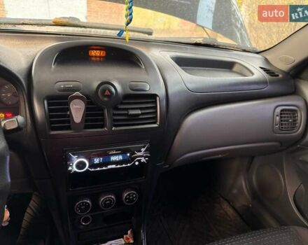 Черный Ниссан Альмера Классик, объемом двигателя 1.6 л и пробегом 212 тыс. км за 5200 $, фото 5 на Automoto.ua