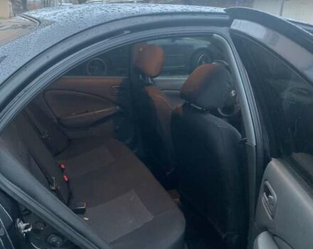 Черный Ниссан Альмера Классик, объемом двигателя 1.6 л и пробегом 167 тыс. км за 5999 $, фото 4 на Automoto.ua