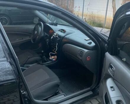 Черный Ниссан Альмера Классик, объемом двигателя 1.6 л и пробегом 167 тыс. км за 5999 $, фото 7 на Automoto.ua